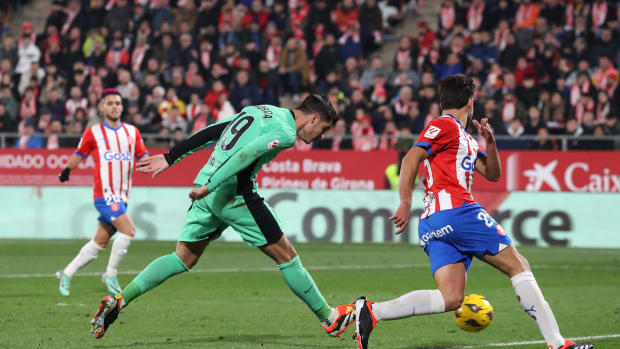 Alvaro Morata pictured (center) scoring a goal for Atletico Madrid during a 4-3 loss at Girona in January 2024